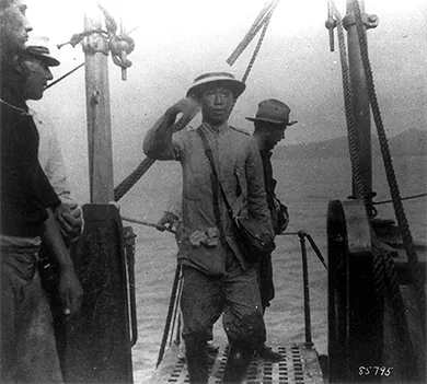 Figure 22.11 Philippine president Emilio Aguinaldo was captured after three years of fighting with U.S. troops. He is seen here boarding the USS Vicksburg after taking an oath of loyalty to the United States in 1901.