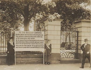 Figure 23.14 Suffragists picketed the White House in 1917, leveraging the war and America’s stance on democracy to urge Woodrow Wilson to support an amendment giving women the right to vote.