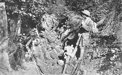 Figure 23.17 This photograph of U.S. soldiers in a trench hardly begins to capture the brutal conditions of trench warfare, where disease, rats, mud, and hunger plagued the men.