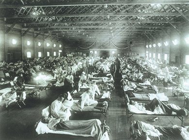 Figure 23.19 The flu pandemic of 1918, commonly called Spanish Flu at the time, swept across the United States, resulting in overcrowded flu wards like this one in Camp Funstun, Kansas, and adding another trauma onto the recovering postwar psyche.