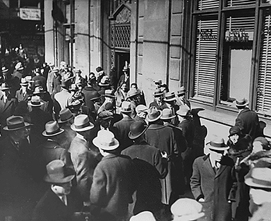 Figure 25.5 As the financial markets collapsed, hurting the banks that had gambled with their holdings, people began to fear that the money they had in the bank would be lost. This began bank runs across the country, a period of still more panic, where people pulled their money out of banks to keep it hidden at home.