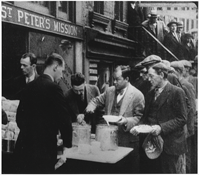 Figure 25.7 In the early 1930s, without significant government relief programs, many people in urban centers relied on private agencies for assistance. In New York City, St. Peter’s Mission distributed bread, soup, and canned goods to large numbers of the unemployed and others in need.