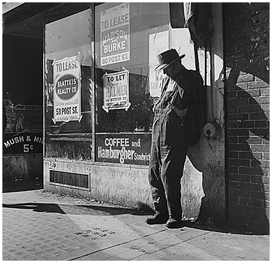 Figure 25.8 Because there was no infrastructure to support them should they become unemployed or destitute, the elderly were extremely vulnerable during the Great Depression. As the depression continued, the results of this tenuous situation became more evident, as shown in this photo of a vacant storefront in San Francisco, captured by Dorothea Lange in 1935.
