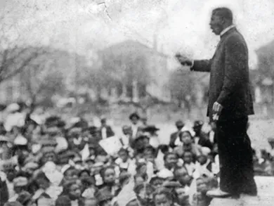 Figure 21.14 In Booker T. Washington’s speech at the Cotton States and International Exposition in Atlanta, he urged his audience to “cast down your bucket where you are” and make friends with the people around them.