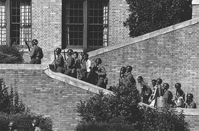 Figure 28.20 In 1957, U.S. soldiers from the 101st Airborne were called in to escort the Little Rock Nine into and around formerly all-white Central High School in Little Rock, Arkansas.
