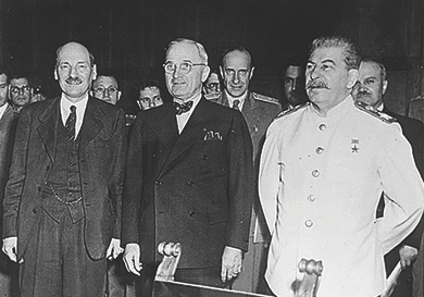 Figure 28.4 At the postwar conference in Potsdam, Germany, Harry Truman stands between Joseph Stalin (right) and Clement Atlee (left). Atlee became prime minister of Great Britain, replacing Winston Churchill, while the conference was taking place.